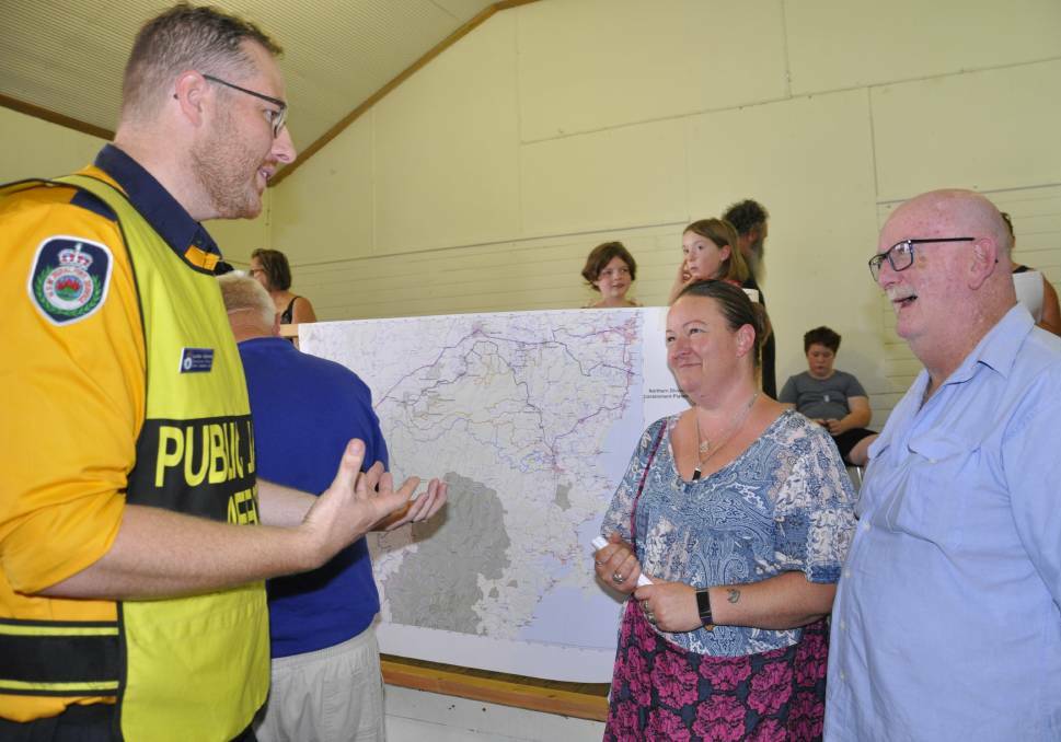 ADVICE: RFS Southern Tablelands operations officer Lachlan Gilchrist talks to Windellama district residents. Photo: Louise Thrower.