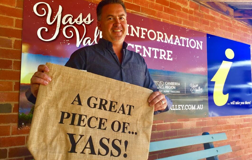 Yass Valley Economic Development and Tourism Manager Sean Haylan with the authentic 'A great piece of Yass' shopping bay. Photo: Jessica Cole.  
