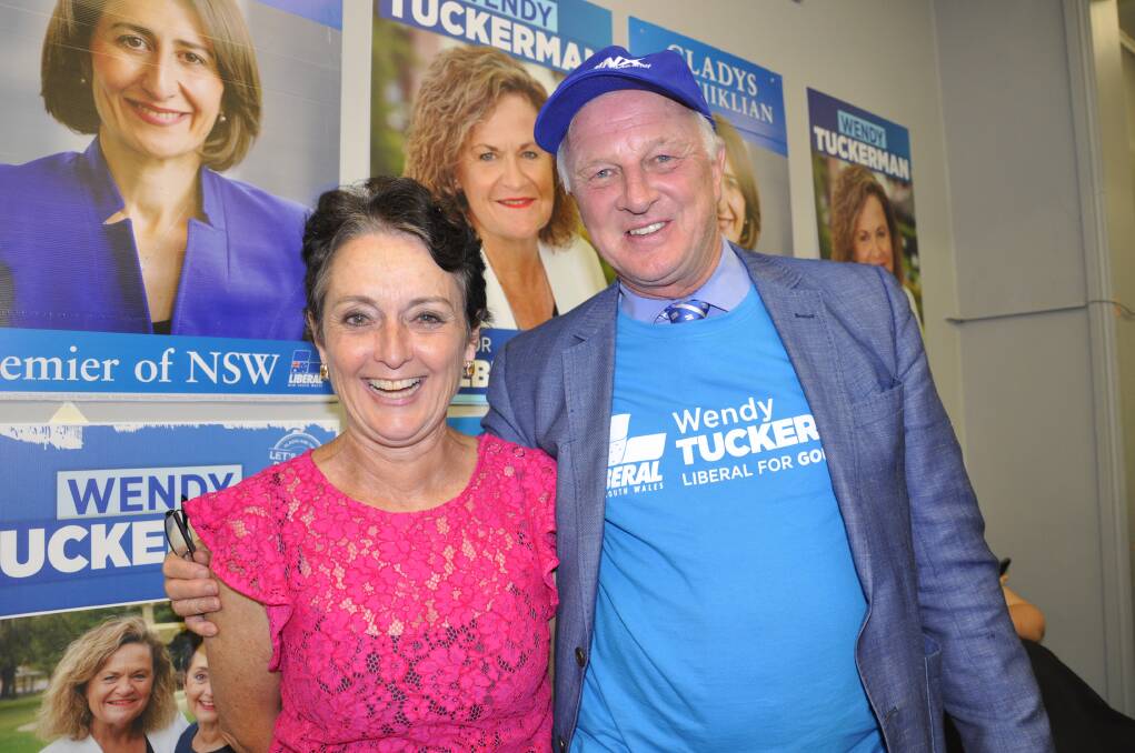 Pru Goward with supporter Sydney man Philip Wood at the Liberal Party gathering on Saturday night as preliminary election results flowed through. Photo: Louise Thrower.  