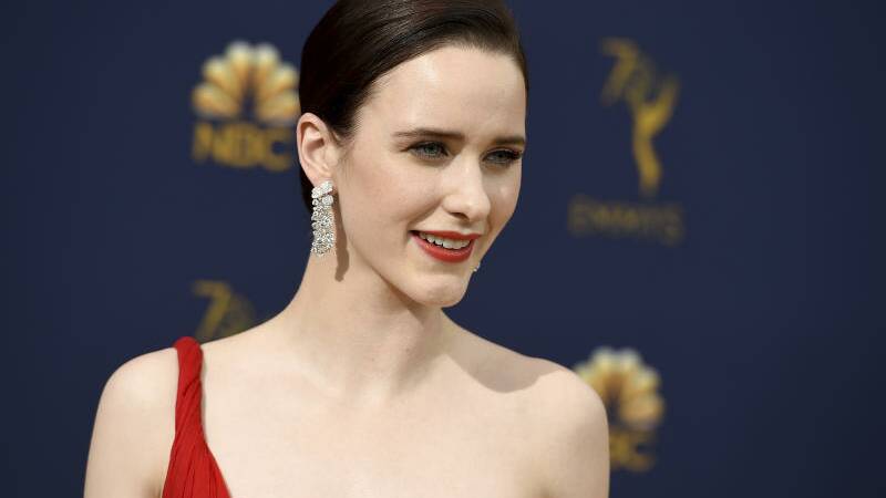 Stars shine on gold carpet at Emmy awards