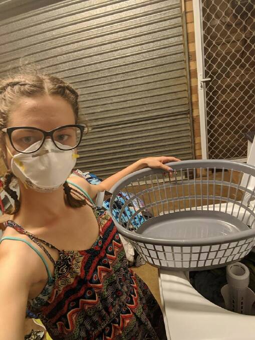 Local resident Shelby Marks was wearing the correct P2 mask in her unsealed garage while she was doing a load of washing on December 21. Various hospitals and medical centres throughout the region are giving away free P2 face masks to protect residents from the poor air quality. 