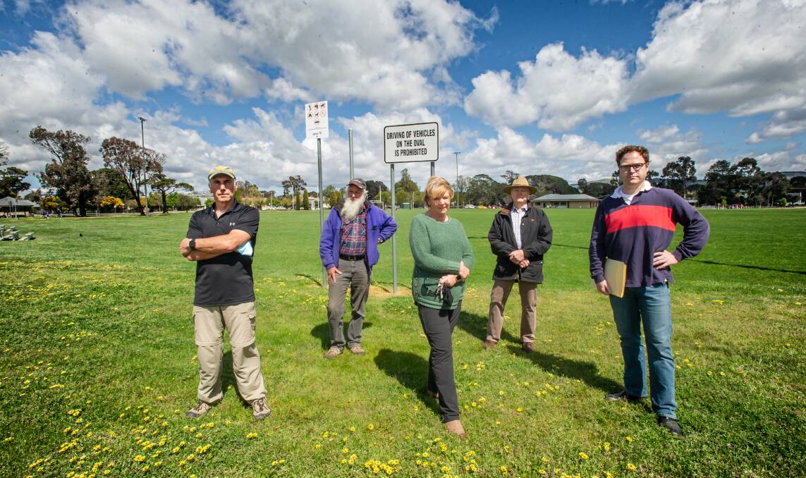 Save Bungendore Park supporters (from left) Cliff Cole, Mark Lintermans, Caroyn Cole, Richard Gregory and Stuart Gregory. Picture: Karleen Minney. 