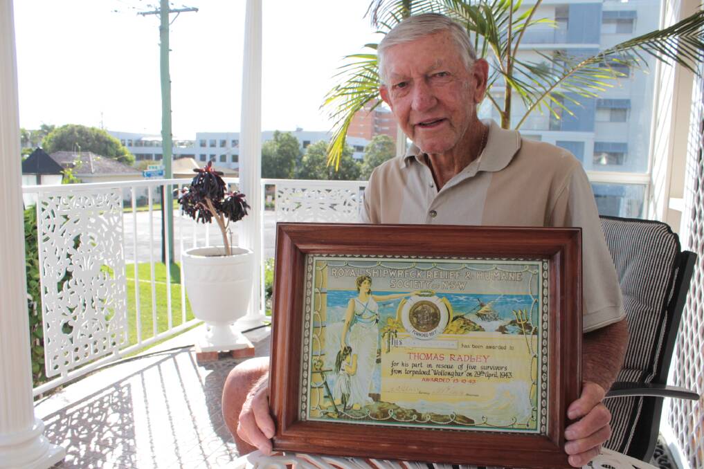 BATTLED HEAVY SEAS: Cec Radley with the bravery award presented to his father Thomas, one of six crewmen aboard the trawler XLCR recognised for rescuing the survivors from SS Wollongbar II.