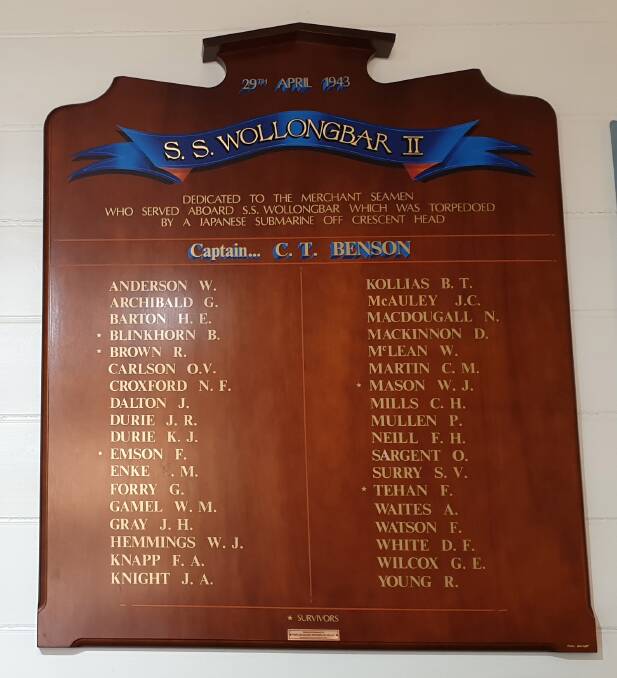 SO MANY LOST: A memorial board with the names of those aboard Wollongbar II when it was hit by two Japanese torpedoes. Asterisks mark the five survivors. 
