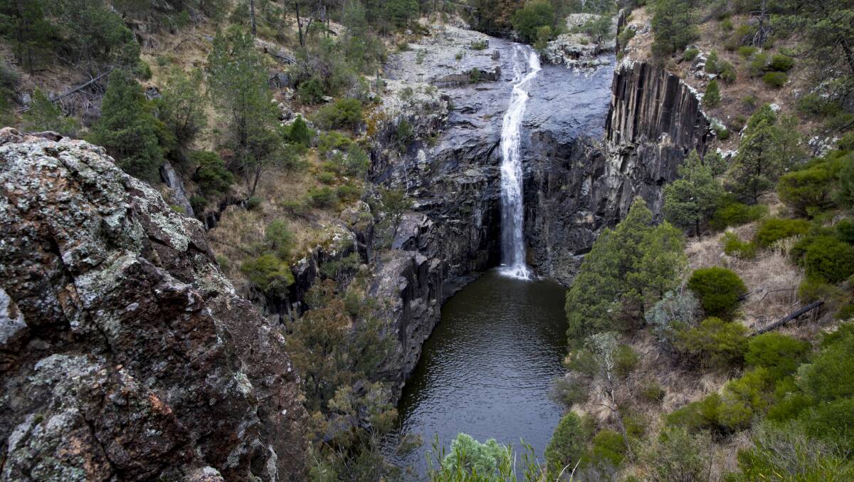 The owner of Ginninderra Falls, pictured, is 'busting' to see the site reopened. Picture: Sitthixay Ditthavong