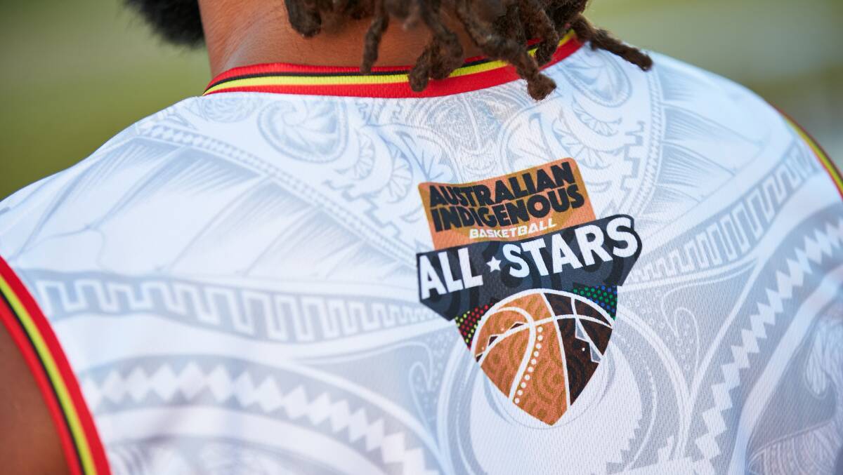 Patty Mills models the new Australian Indigenous Basketball All Stars jerseys designed by Harry Pitt. Picture: Travis Hayto