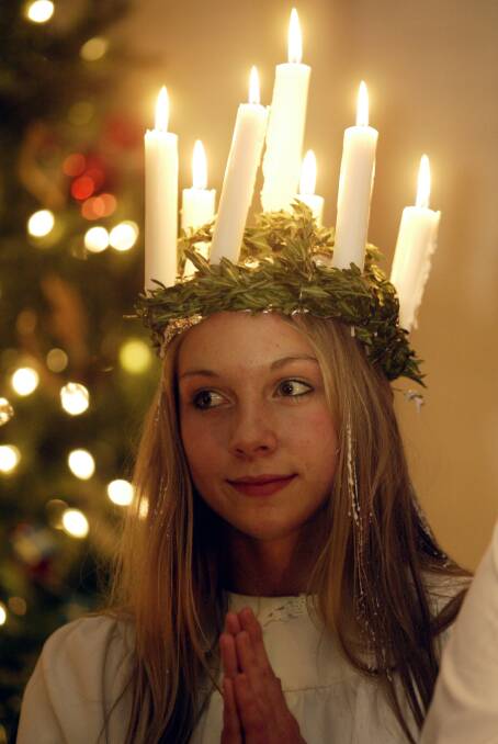 ADVENT: The Swedish Julfest signifies the start of the festive season, with a girl dressed as St Lucia leading the procession.