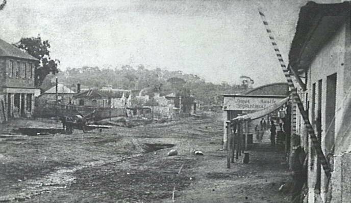 MAIN DRAG: Comur (Cooma) Street looking towards the bridge, Yass c1860 showing corner store and old Telegraph Office. Photo: 000700 YDHS Inc Archives