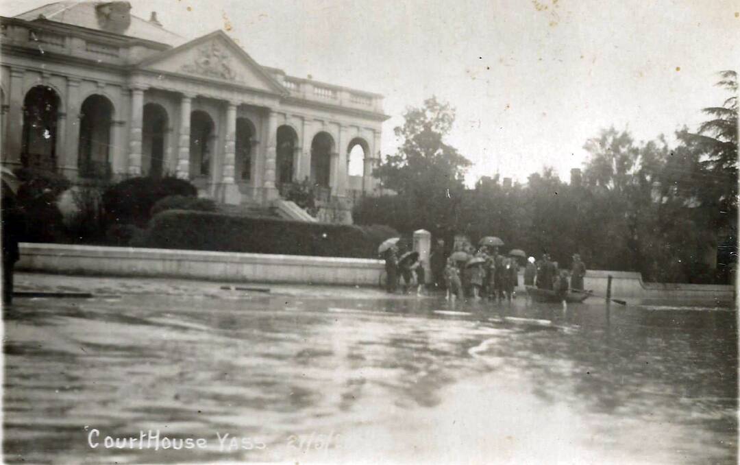 SAFE SPOT: The flood of 1925, with people sheltering on the Courthouse steps. Photo: Yass & District Historical Society Collection.