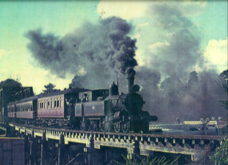 INTO TOWN: Engine 1311 crossing the railway bridge as it approached Dutton Street. Photo: Yass Railway Historical Society.