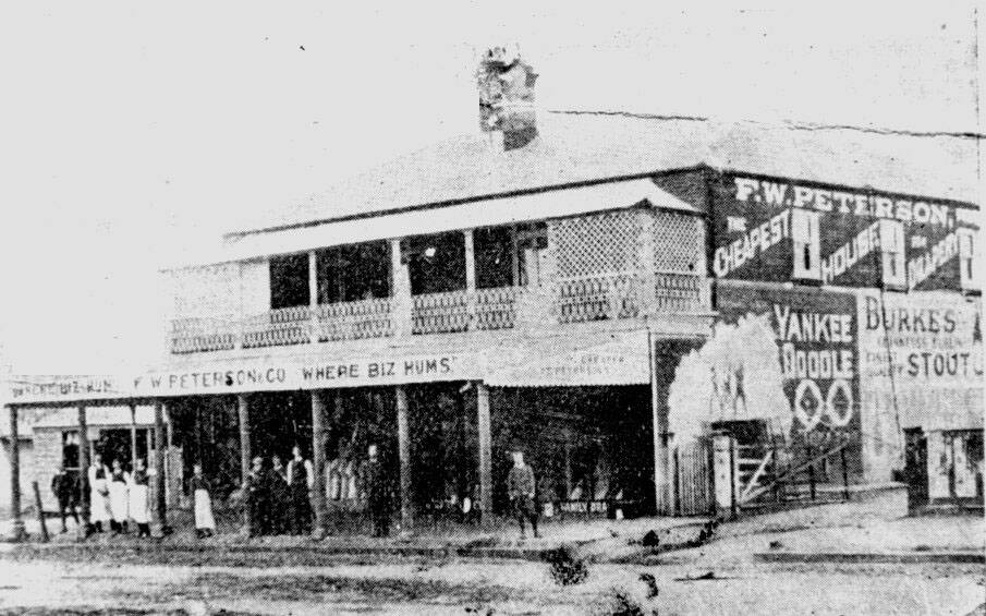 STREETSCAPE: FW Peterson's store c.1900. The banner reads: "Where biz hums". Photo: Yass & District Historical Society Collection