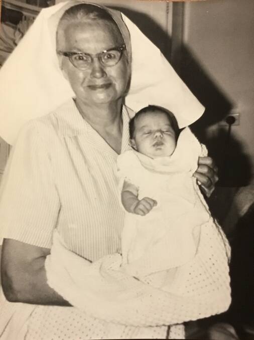 IMPORTANT ROLE: Sister Burgess with baby Tanya December 13, 1973. Courtesy Yass & District Historical Society. 