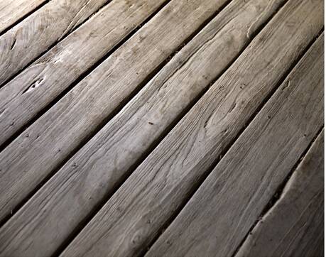 The worn floorboards of the Offley home.