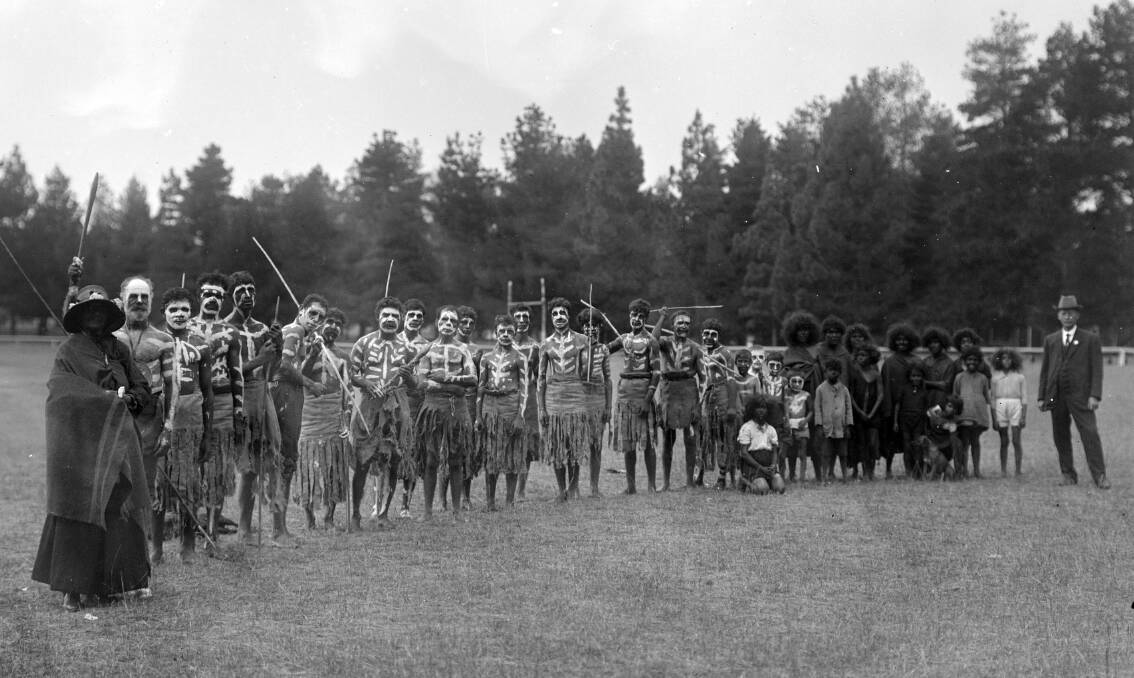 Local Ngunnawal people preparing for the 1921 street procession commemorating the centenary of Hamilton Humes sighting of the Yass Valley.Photo: State Library of NSW ON 165/70-80