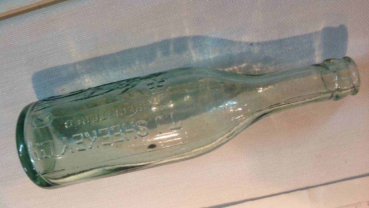 OLD STYLE: An original Sheekey’s soft drink bottle, which can be seen at Yass Museum.