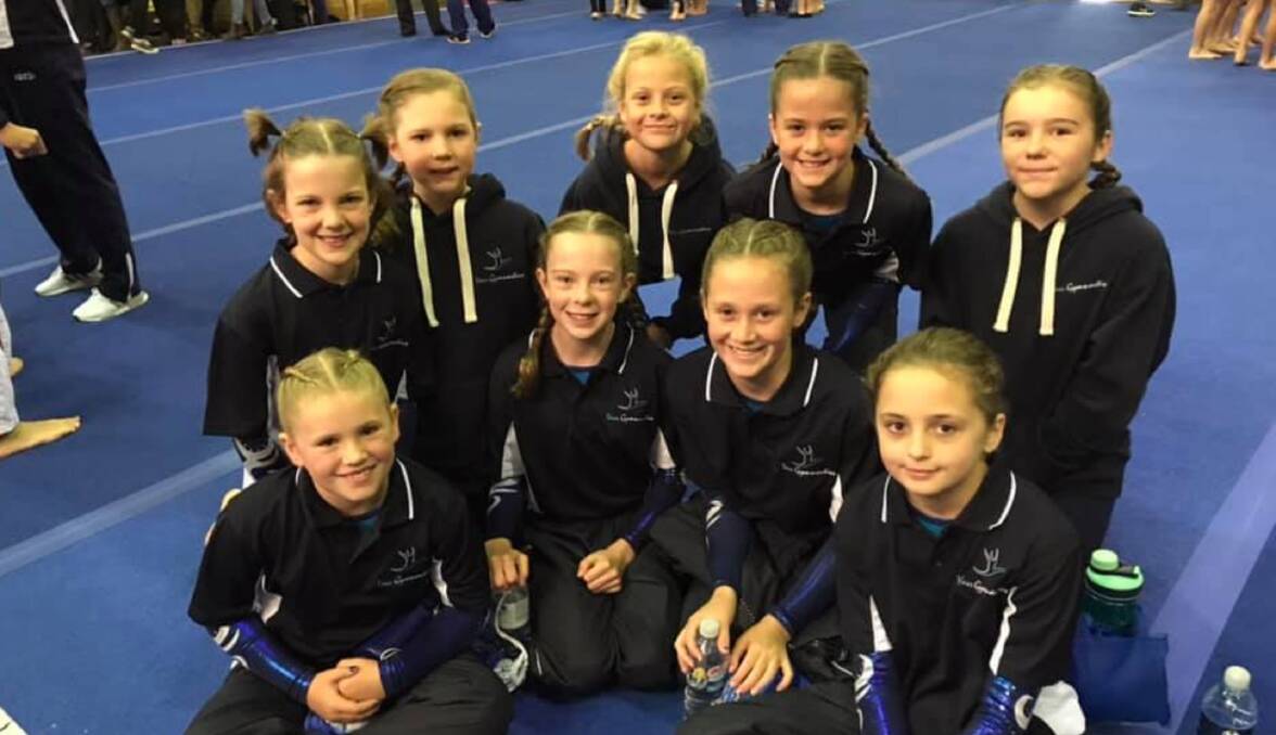 The team: Yass's level three and four competitors can't contain their glee at the Dubbo competition recently. Photo: Yass Gymnastics. 