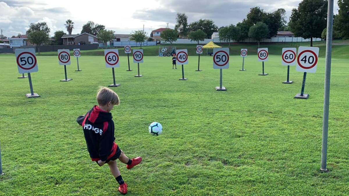 Target practice: There was no shortage of opportunities for the kids to have fun at the Open Day last Saturday. Photo: Yass Football Club.