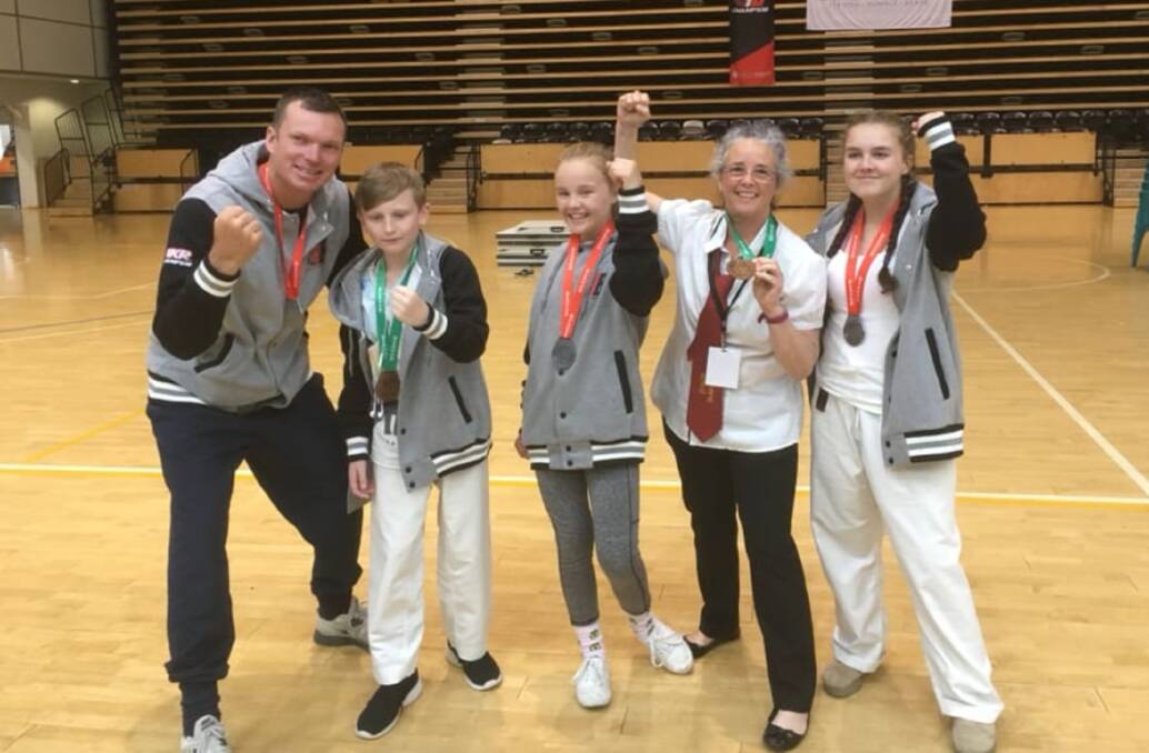 Winners: Chris Pothan and his students, all of whom claimed medals at the GKR National Championships in Melbourne recently. Photo: GKR Yass. 