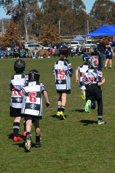 Onward march: the Rams Under-8's take the field for the last time this season during the Canberra tournament last weekend. Photo: Yass Junior Rugby League. 