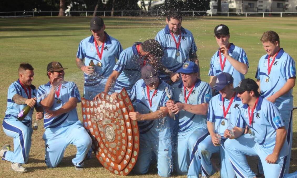 Celebrations: The Snipers (seen here after winning the 2018/19 grand final) combined with the Piranhas to form the Cobras. Photo: Zac Lowe.