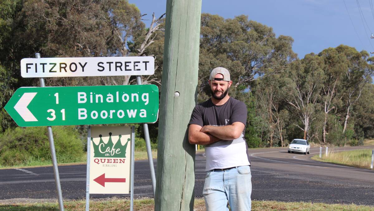 The bend: Steve Palmer in front of the intersection which has been the location of many crashes during his eight years in Binalong. Photo: Zac Lowe. 