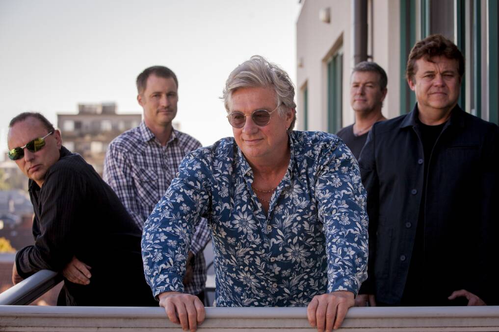 GOOD TIMES: Keyboardist Greedy Smith (centre) with Mental As Anything bandmates Jacob Cook (drums), Peter Gray (bass), Martin Cilia (guitar) and Craig Gordon (guitar), playing Yass on May 4. Photo: supplied