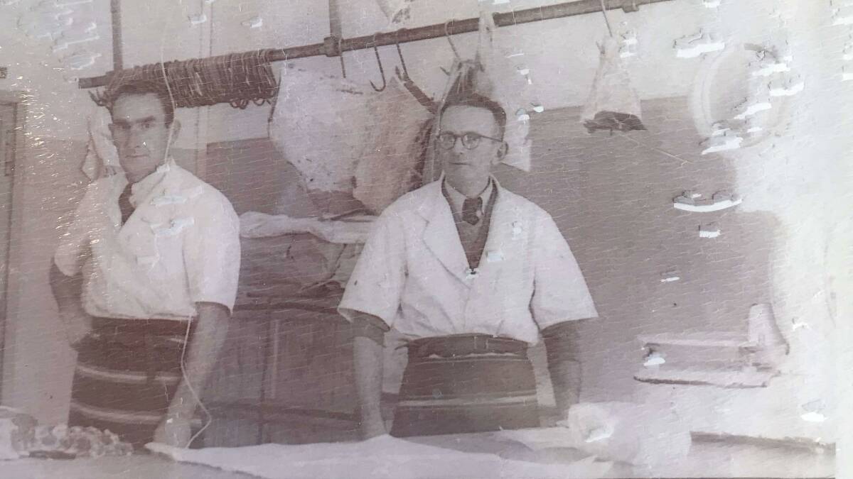 Bill (right) with an employee working for him in Campsie when the business was in Sydney.
