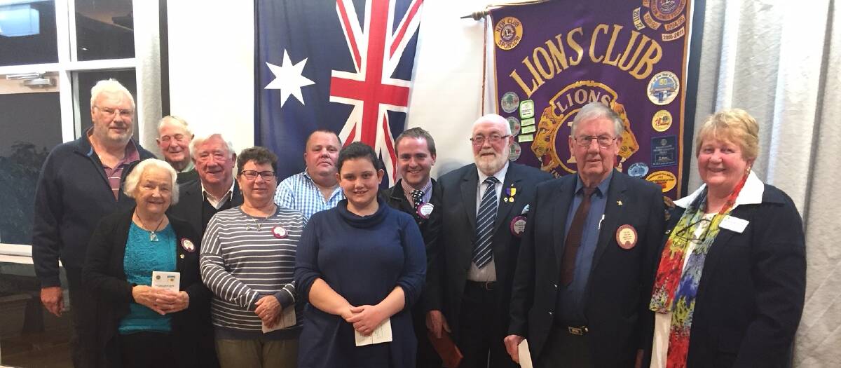 Yass Lions Club board for 2018/19 with zone president Margaret McPherson (right).