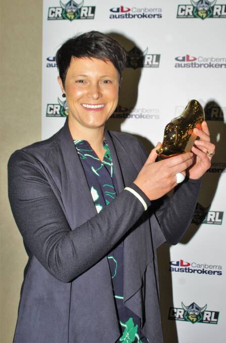 TOP SCORER: Sally Curry with her league tag golden boot received at the Canberra Region Rugby League award night. Photo: Darryl Fernance