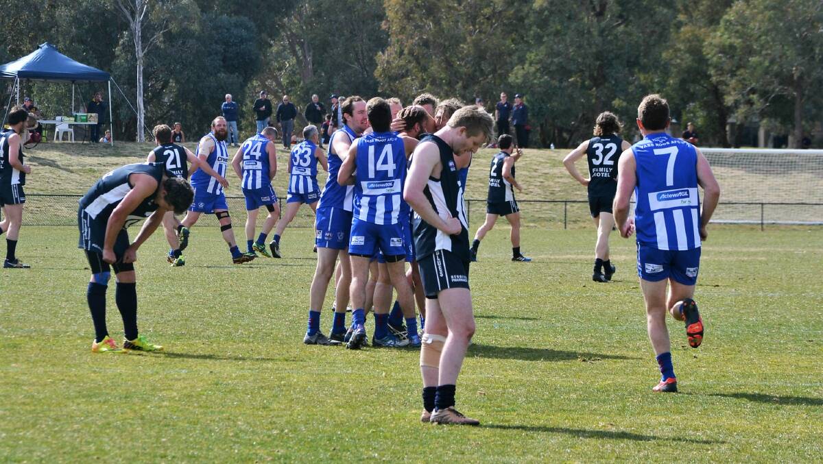Mirror image: The Roos will have to bring the form that won them the grand final back for this weekend's clash against the Goulburn Swans. Photo: Zac Lowe. 