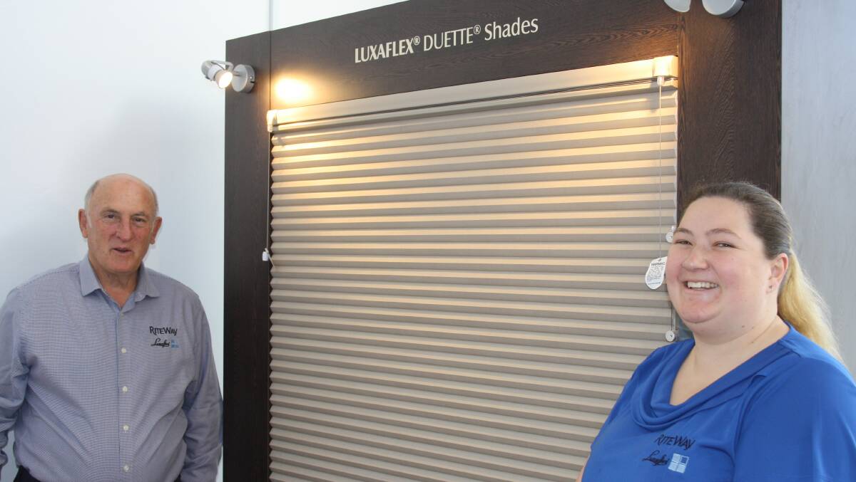 STATE OF THE ART: Allan Smith from RiteWay Curtains and Blinds and Yass showroom manager, Jo Bahr with the LUXAFLEX®  DUETTE Shades, which provide the ultimate in versatile light control, privacy and energy efficiency.
