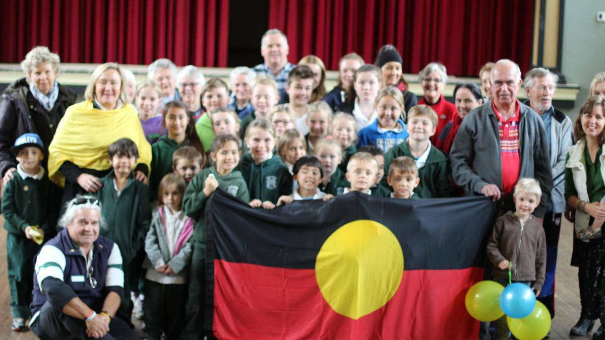local primary school students and members of the Yass Valley community marked Reconciliation Week in 2016 with a flag-raising ceremony. Photo: Jessica Cole