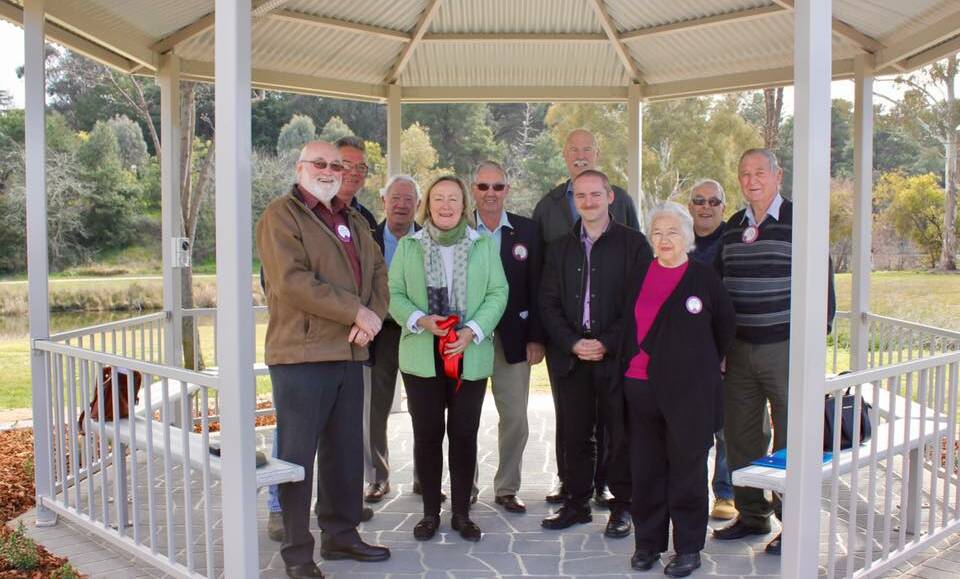 OPENED: Mayor Rowena Abbey with councillors, Lions Club and Yass Garden Club at the rotunda opening. Photo: Toby Vue