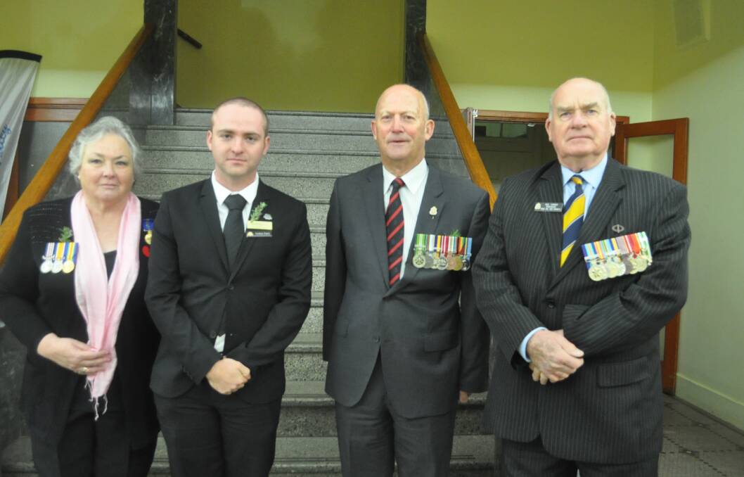 John Heggart (second from right) is the honorary secretary of the Yass Sub-Branch of RSL NSW. He is pictured here with L-R: OAM recipient Jan Wilson, councillor Nathan Furry and Yass RSL Sub-Branch president Neil Turner at the 2018 Anzac Day Dawn Service at the Yass Soldiers Memorial Hall. Photo: Toby Vue.