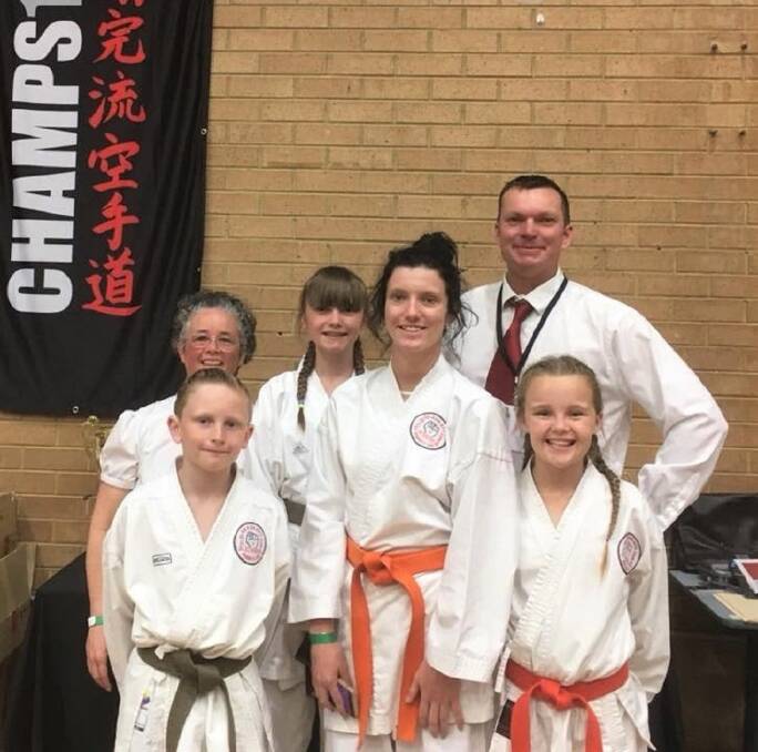 STRONG EFFORT: A number of the junior and senior members of the Yass Go-Kan-Ryu (GKR) Karate club, who secured medal placings, at the 2017 National Championships in Liverpool. Photo: Yass GKR Karate