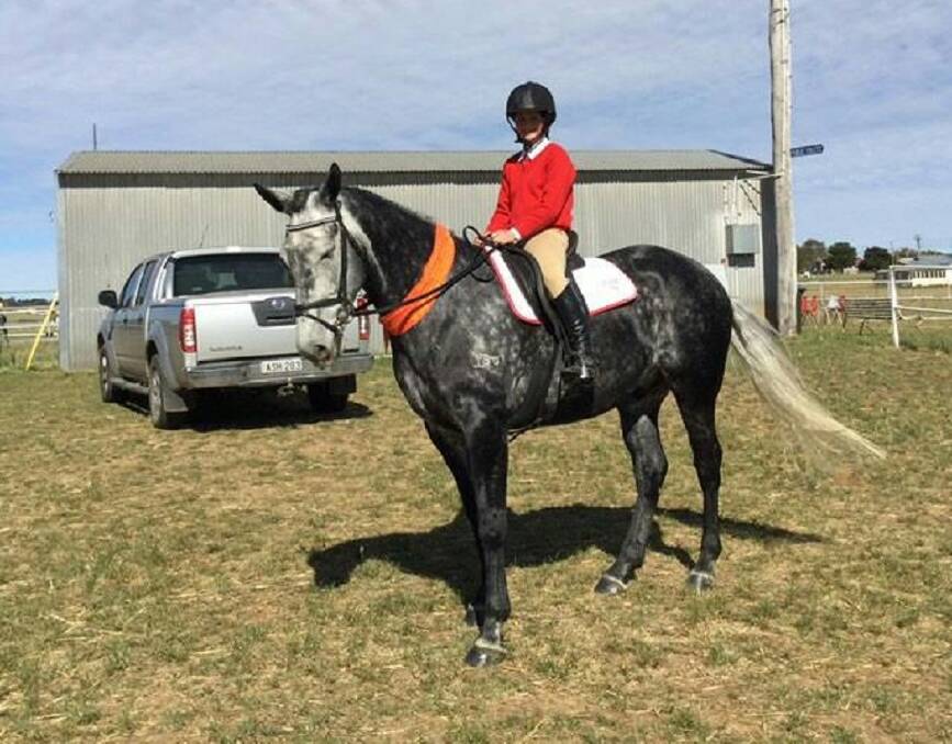 HAPPY WITH RESULT: Lucy O'Sullivan with Jackson at the Pony Club State Championships in Harden where she finished fourth. Photo: Supplied
