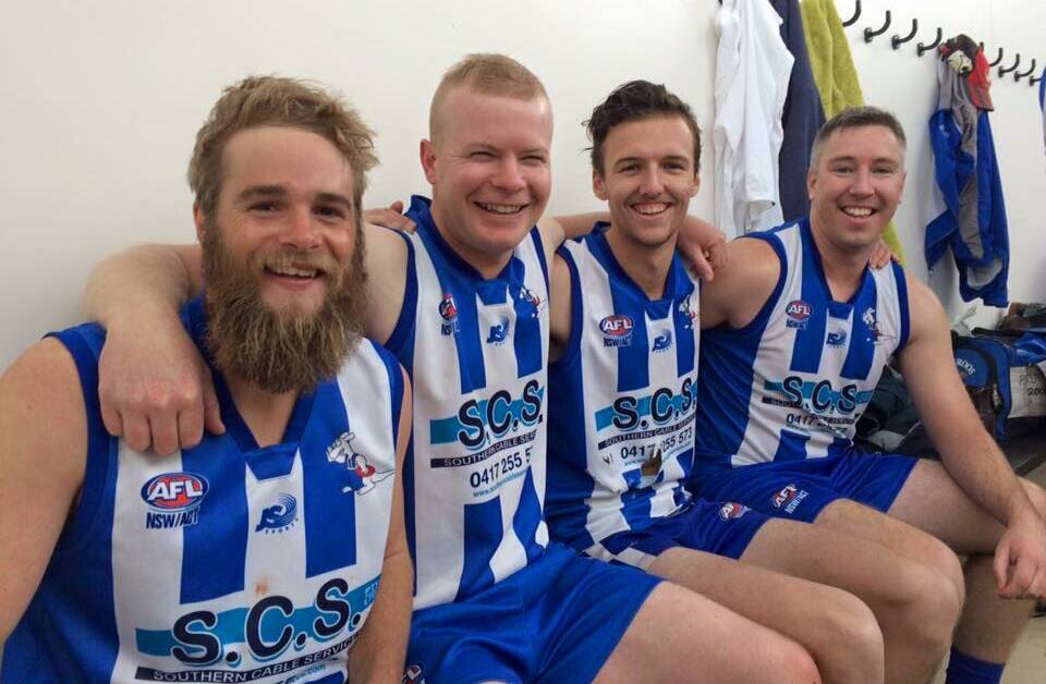 MASSIVE WIN: The Yass Roos began their 2017 in the best possible way - thrashing the opponents. Picture are a few of the players after a win in 2016. Photo: Yass Roos Australian Football Club