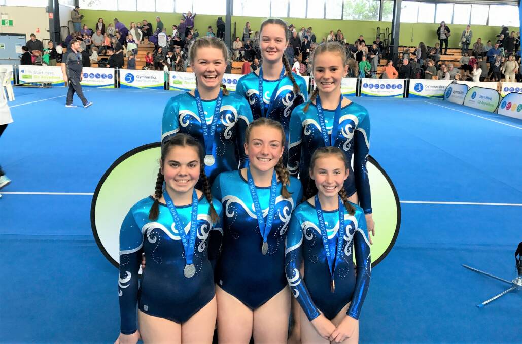STRONG SHOWING: A number of Yass gymnasts happy with their performances, which include multiple silver and bronze medals, at the Country Championships in Newcastle on July 6–10. Photo: Yass Gymnastics.