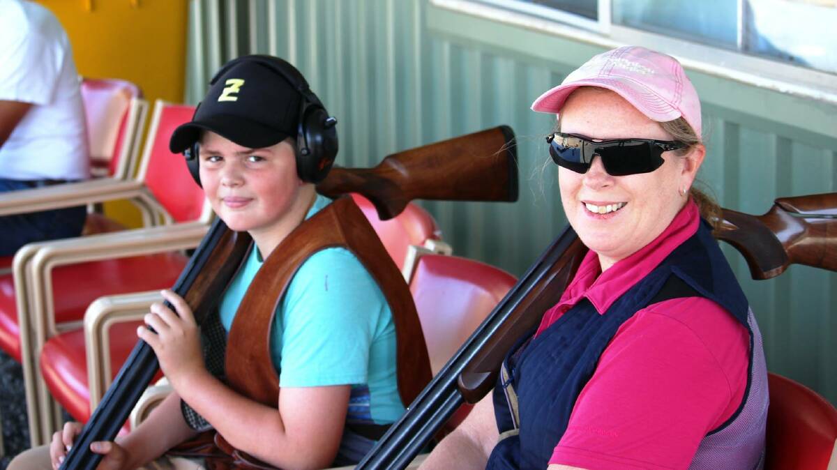 STRONG FINISH TO YEAR: A couple of the shooters at the Yass Clay Target Club's final 2017 competition in December. Photo: Supplied