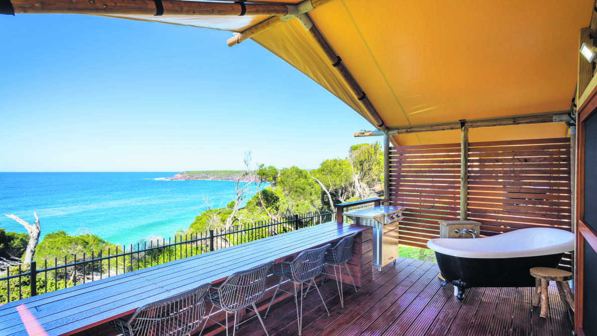 Room with a view: The safari tents at Merimbula Beach Holiday Resort overlook the ocean and make you feel like you're sleeping under the stars. Image: Destination NSW