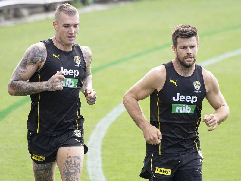 Dustin Martin and Trent Cotchin (r) are two of Richmond's most influential AFL players.