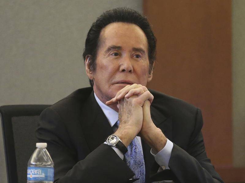 A woman is suing Wayne Newton for her daughter being bitten by a monkey at the singer's former home.