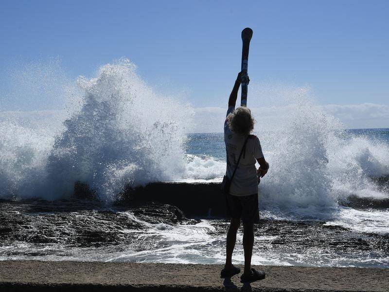 The didgeridoo and the crashing noise of the ocean are sounds that signify "home" to Australians.