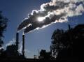NSW could enshrine a 2030 goal of a minimum 50 per cent cut in greenhouse gas emissions. (Dave Hunt/AAP PHOTOS)