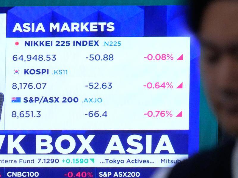 Markets edged down after conflicting signals on the progress of US-Iran talks and fresh strikes. Photo: AP PHOTO