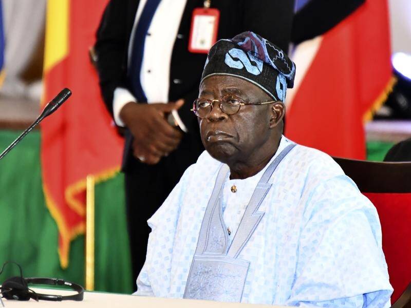 Nigerian President Bola Tinubu has urged his rivals and their backers to support his government. (AP PHOTO)