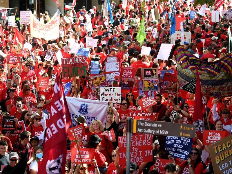 Thousands of NSW teachers have marched to parliament house in Sydney.