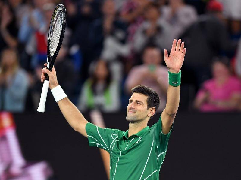 Novak Djokovic (pic) is into the Australian Open semi-finals, beating Milos Raonic in straight sets.