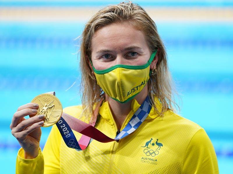 Australia's Ariarne Titmus shows off her Olympic 400m freestyle gold medalat in Tokyo.