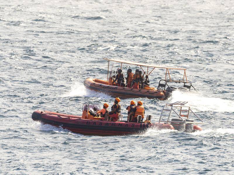 Rescue officials are searching for 27 people missing after a ferry capsized on a Zimbabwean lake. Photo: EPA PHOTO Rescue officials are searching for 27 people missing after a ferry capsized on a Zimbabwean lake. Photo: EPA PHOTO